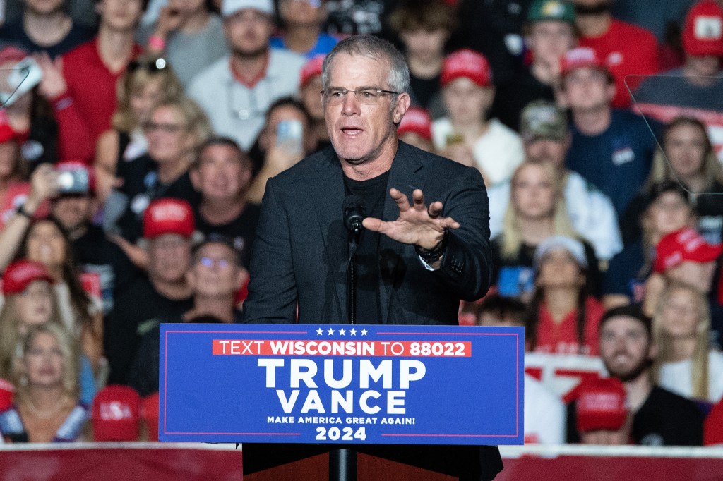 Brett Favre speaking at a Trump campaign rally in Green Bay on Oct. 30, 2024.