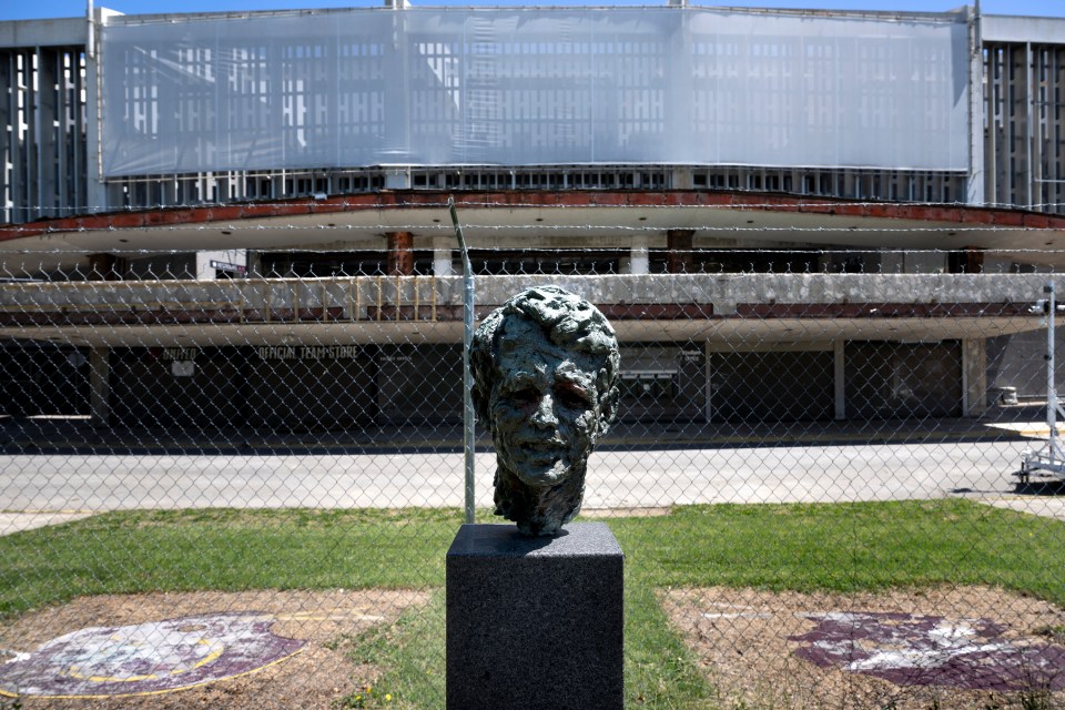 A bust of Robert F. Kennedy Jr. stands outside the stadium