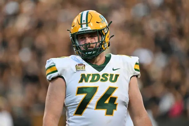 NDSU football player #74 in uniform.