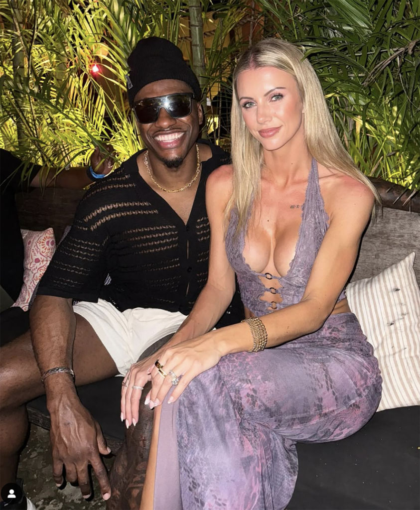Robert Griffin III posing with his wife Grit Šadeiko