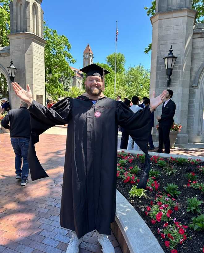 james hurst graduates with a masters in business