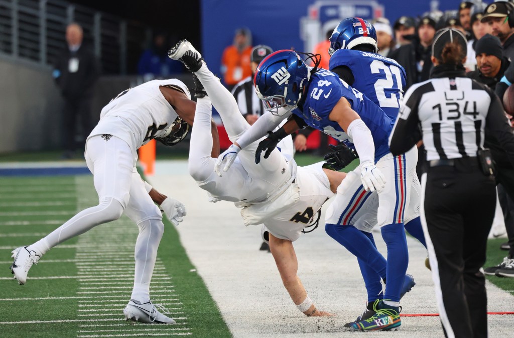 Saints quarterback Derek Carr (4) injured on a run play during the second half when the New York Giants played the New Orleans Saints Sunday, December 8, 2024 at MetLife Stadium in East Rutherford, NJ
