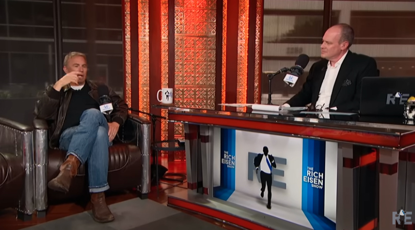 Riche Eisen interviewing Kevin Costner on his show in 2017.