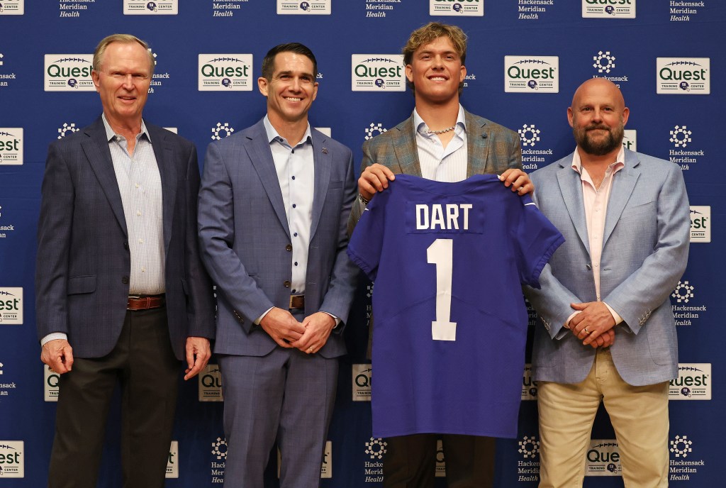 Giants owner John Mara, New York Giants GM Joe Schoen, Jaxson Dart and New York Giants Head Coach Brian Daboll