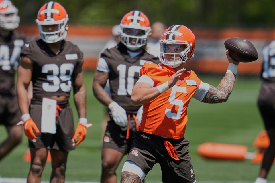 Cleveland Browns quarterback Dillon Gabriel throwing a football at rookie minicamp.