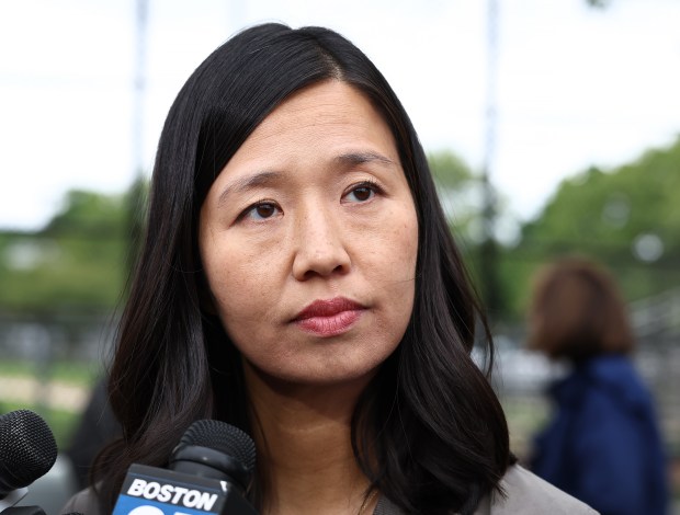 Dorchester, MA - Mayor Michelle Wu takes questions from the media at the Dorchester Coffee Hour. (Nancy Lane/Boston Herald)