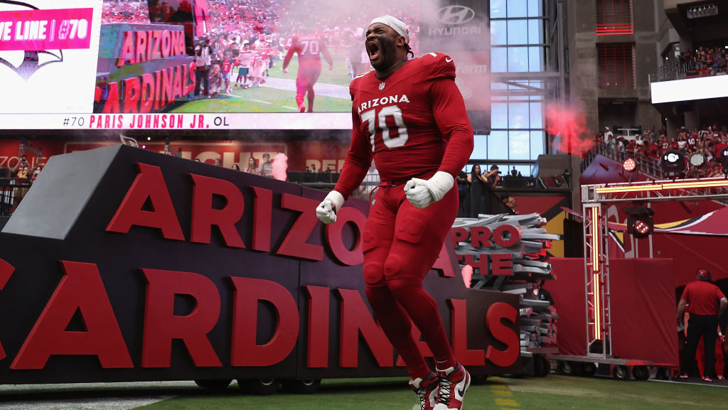 Paris Johnson Jr. runs out of the tunnel...