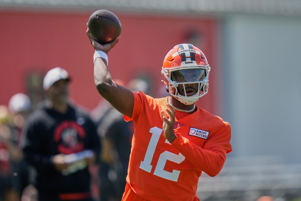 Shedeur Sanders, Cleveland Browns quarterback, throwing a football.