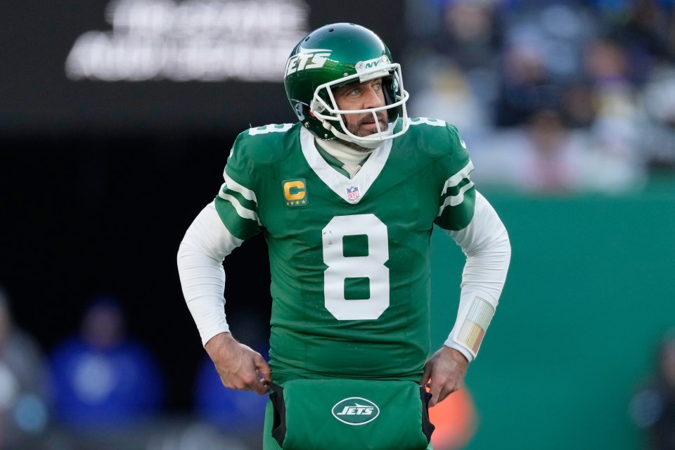 Aaron Rodgers, New York Jets quarterback, on the field.