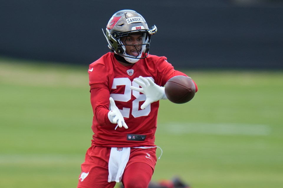 Tampa Bay Buccaneers safety Shilo Sanders catches the ball during the NFL football team's rookie minicamp Friday, May 9, 2025, in Tampa, Fla. (AP Photo/Chris O'Meara)