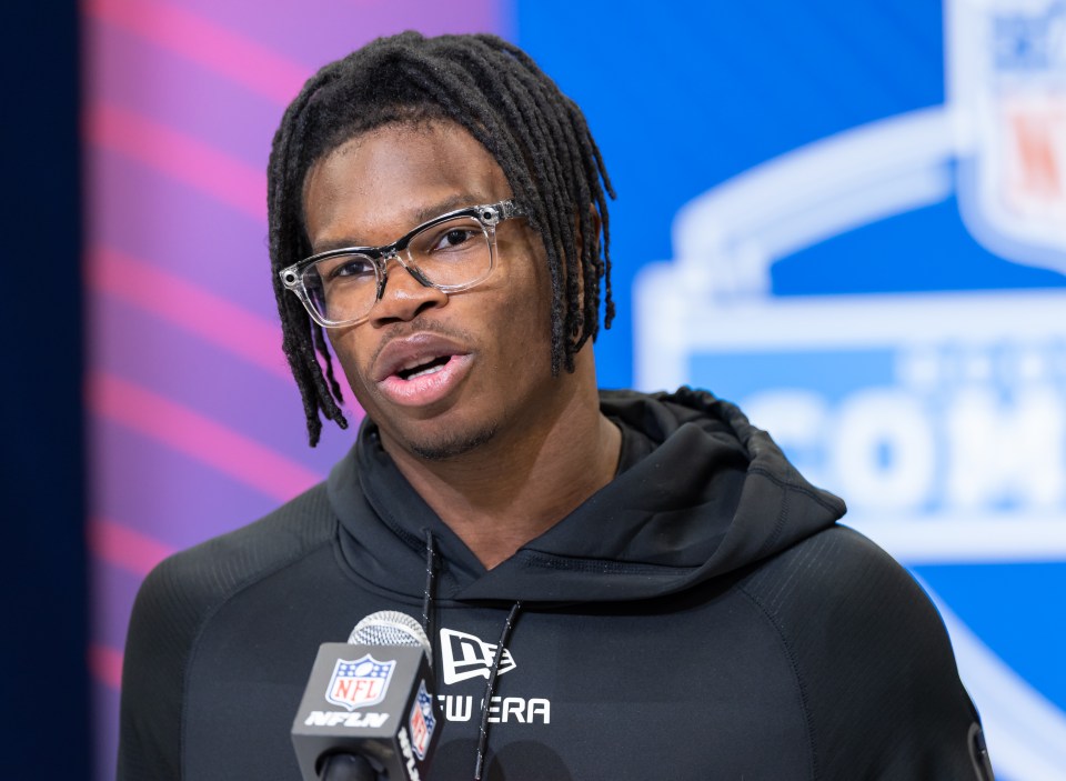 Travis Hunter speaking at a press conference.