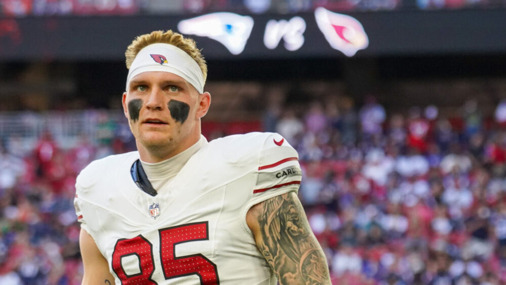Arizona Cardinals TE Trey McBride looks on during pregame....