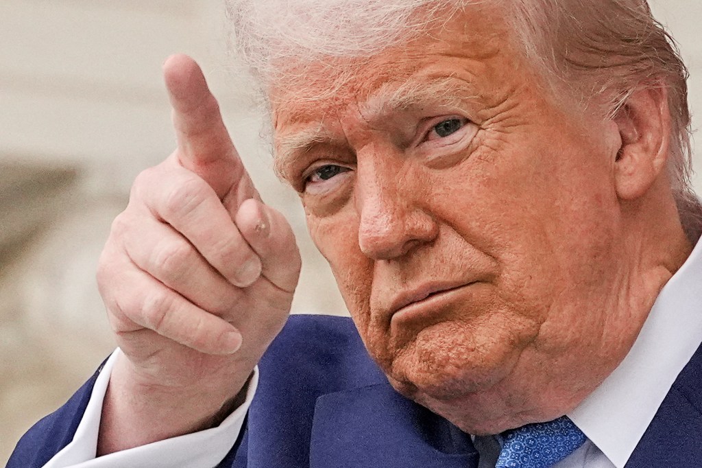 U.S. President Donald Trump gesturing at the annual National Memorial Day Observance in Arlington National Cemetery
