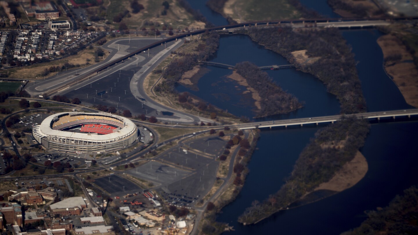 Biden signs RFK Stadium land bill into law, a step toward potential Commanders stadium in Washington