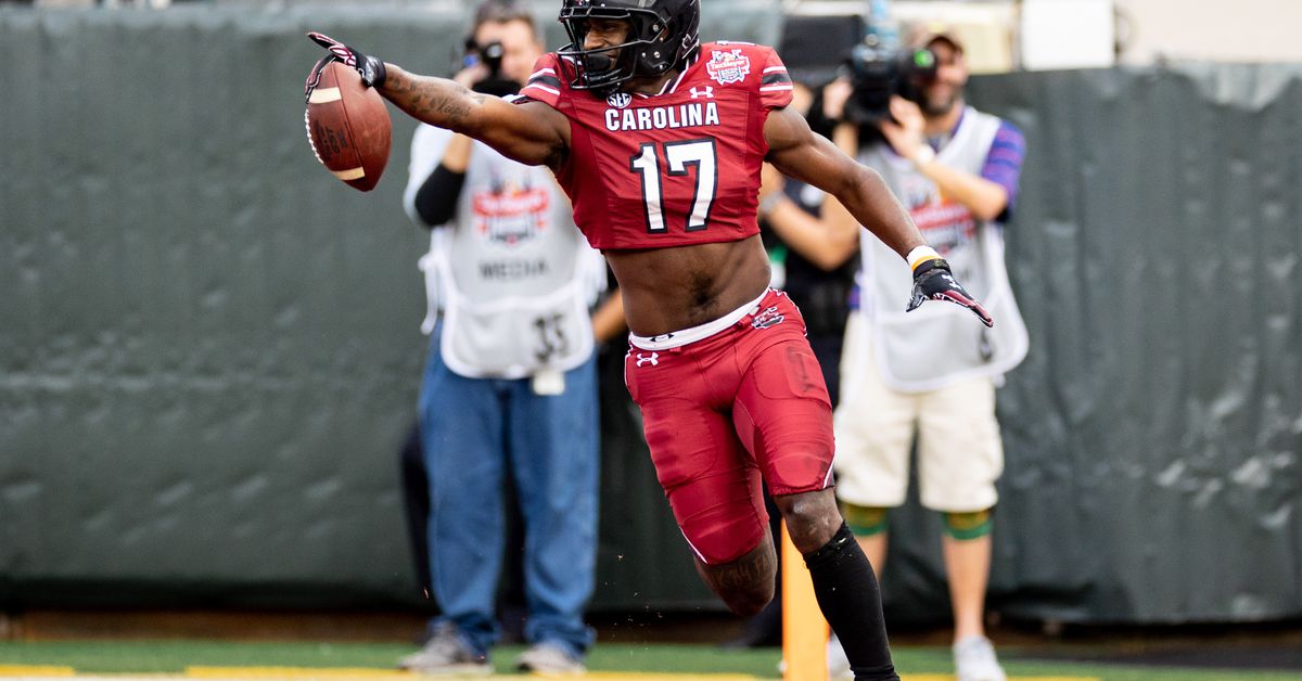 Which college football conferences produced the most players on the Panthers roster?