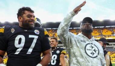 Cameron Heyward and head coach Mike Tomlin exit the field after a 2024 victory over the Baltimore Ravens