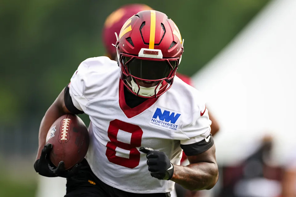 ASHBURN, VA - JULY 25: Brian Robinson Jr. #8 of the Washington Commanders participates in a drill during training camp at OrthoVirginia Training Center at Commanders Park on July 25, 2024 in Ashburn, Virginia. (Photo by Scott Taetsch/Getty Images)