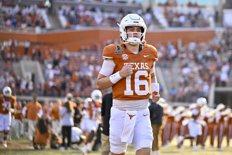 Texas Longhorns quarterback Arch Manning takes the field before his team's College Football Playoff game.Jerome Miron-Imagn Images