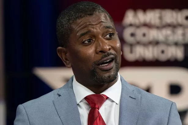 Jack Brewer speaks during a panel 