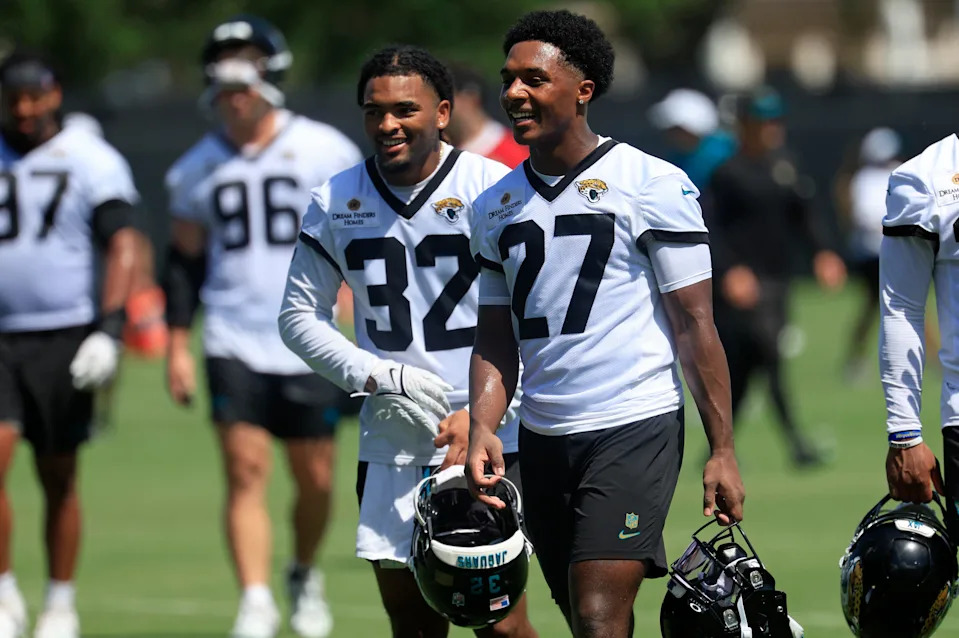 Jacksonville Jaguars cornerback Caleb Ransaw (27) smiles with safety Cam'Ron Silmon-Craig (32) during the second mandatory minicamp at Miller Electric Center Wednesday, June 11, 2025 in Jacksonville, Fla.