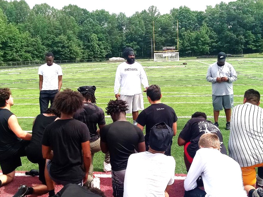 Let's go camping: New and veteran football coaches find purpose in summer workouts