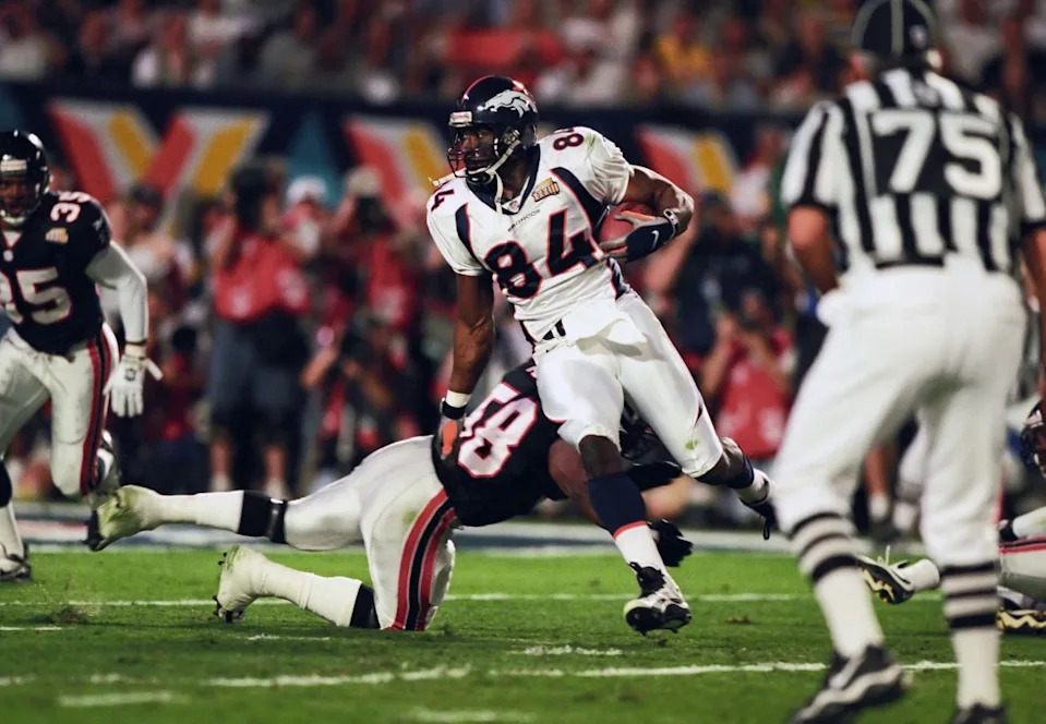 Denver Broncos tight end #84 Shannon Sharpe catches a pass over the middle during Super Bowl XXXIII against the Atlanta Falcons at Pro Player Stadium. The Broncos defeated the Falcons 34-19 earning their second consecutive Super Bowl title. Photo By Imagn Images © Copyright Imagn Images