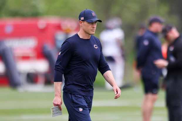 Bears coach Ben Johnson walks on the field during practice at Halas Hall on Tuesday, June 3, 2025. (Eileen T. Meslar/Chicago Tribune)