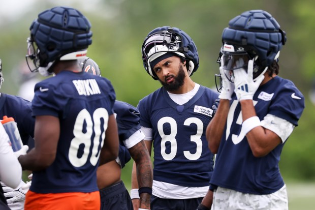 Bears wide receiver Samori Toure (83) stands with teammates during practice at Halas Hall on Tuesday, June 3, 2025. (Eileen T. Meslar/Chicago Tribune)