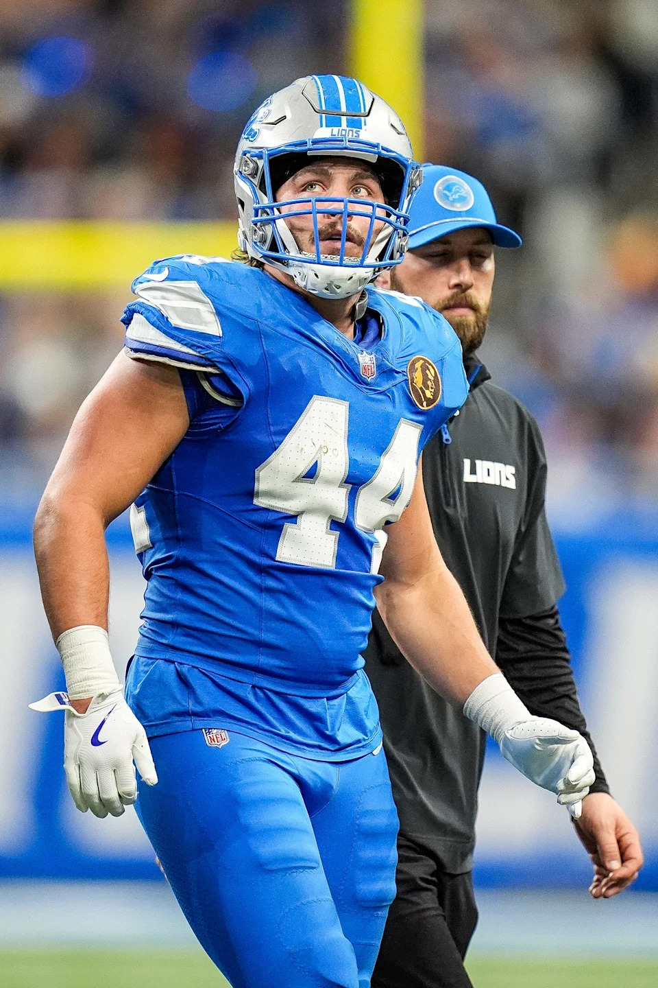 Detroit Lions linebacker Malcolm Rodriguez walks off the field due to an injury during the second half against the Chicago Bears at Ford Field in Detroit on Thursday, Nov. 28, 2024. He tore the ACL in his right knee.