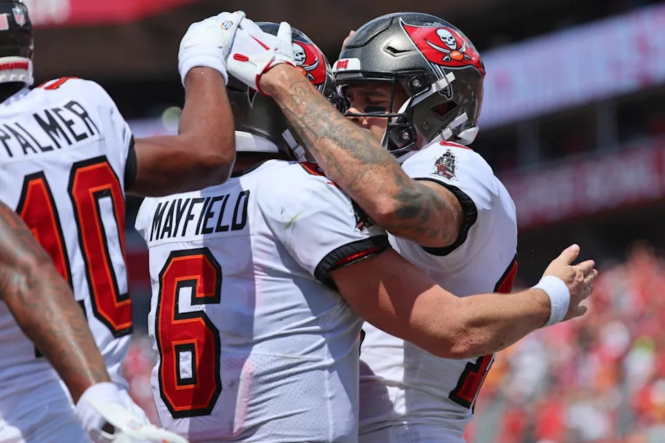 Tampa Bay Buccaneers wide receiver Mike Evans (13) is congratulated by quarterback Baker Mayfield (6) after scoring a touchdown against the Chicago Bears.© Kim Klement Neitzel-Imagn Images