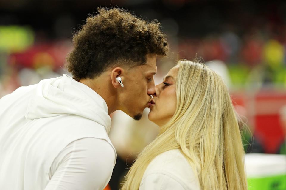 Kansas City Chiefs quarterback Patrick Mahomes kisses his wife Brittany Mahomes before Super Bowl LIX.Geoff Burke-Imagn Images