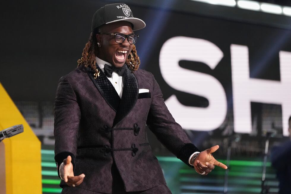 Boise State running back Ashton Jeanty celebrates after being chosen by the Las Vegas Raiders...