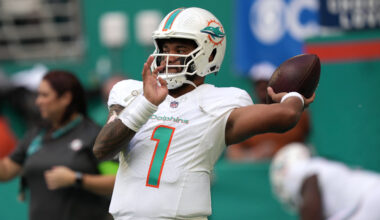 Miami Dolphins quarterback Tua Tagovailoa throws a pass in warm ups