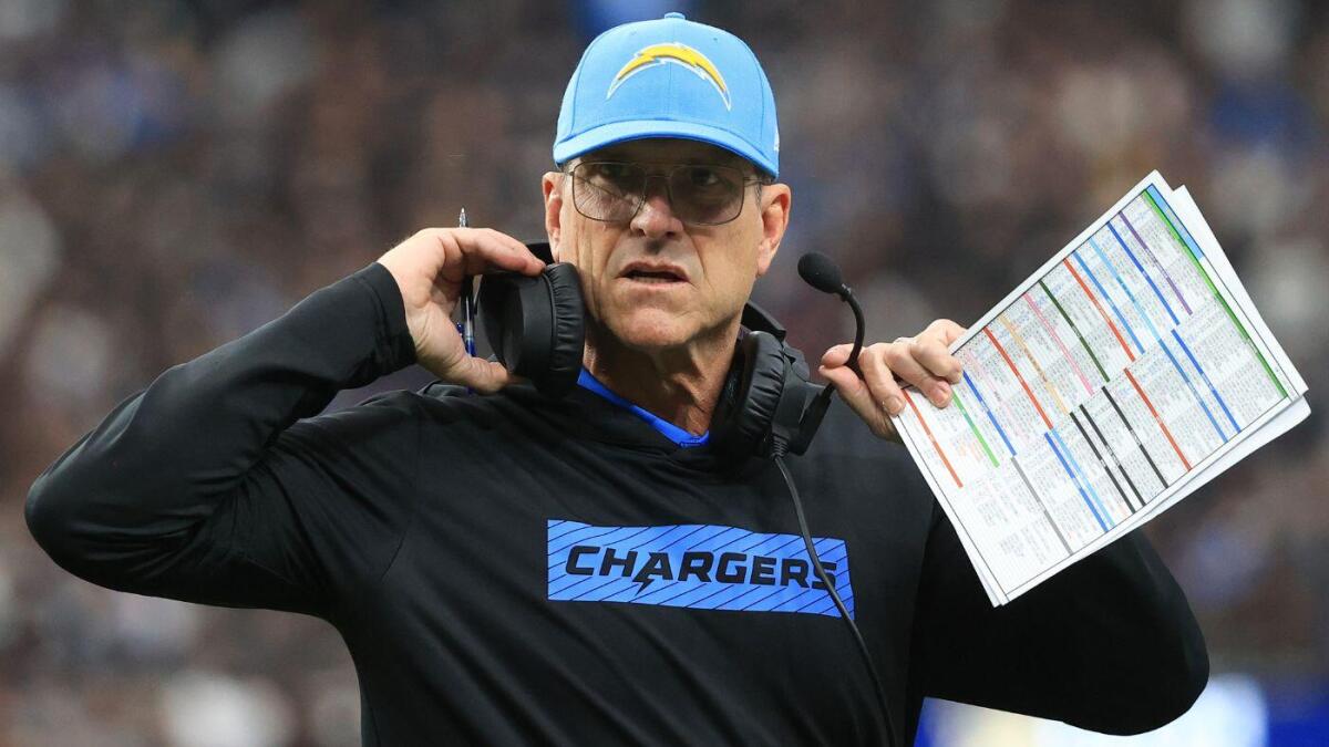 Chargers coach Jim Harbaugh, Michigan officials named in lawsuit tied to Matt Weiss hacking case