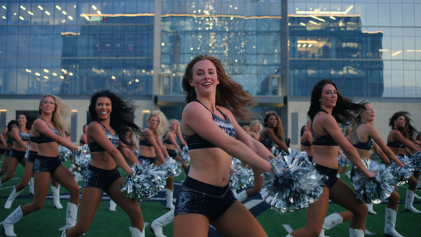 Cheerleaders performing a dance routine 