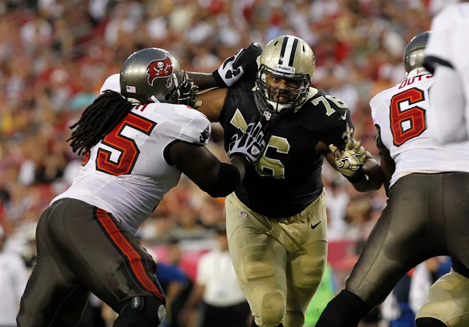 Sep 15, 2013; New Orleans Saints defensive tackle Akiem Hicks (76) rushes against the Tampa Bay Buccaneers. Mandatory Credit: Kim Klement-Imagn Images