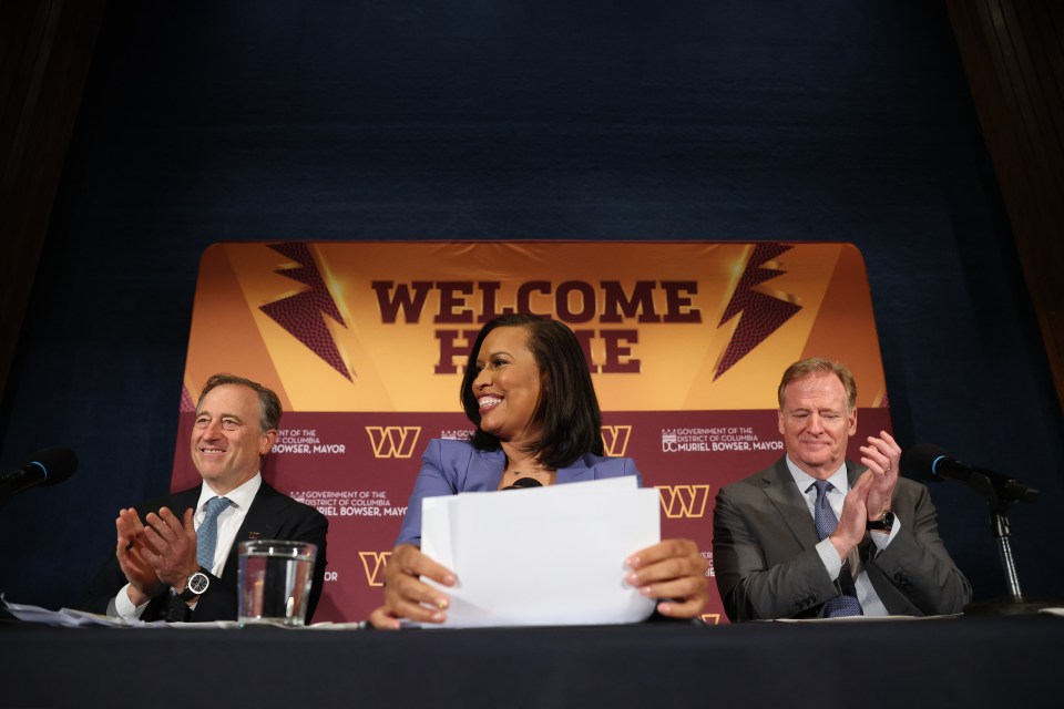 WASHINGTON, DC - APRIL 28: (L-R) Washington Commanders owner Josh Harris, Washington, DC Mayor Muriel Bowser, and NFL Commissioner Roger Goodell hold a news conference on building a new Commanders stadium on April 28, 2025 in Washington, DC. The Commanders and the District of Columbia have reached an agreement to build a new football stadium at the team's former RFK Stadium site. (Photo by Win McNamee/Getty Images)