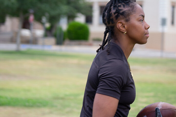 Running Back/Wide Receiver Wyshana Brooks carries the ball during practice.