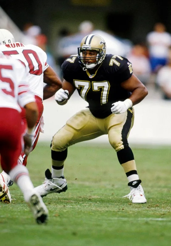 Oct 31, 1993; FILE PHOTO; New Orleans Saints tackle Willie Roaf (77) blocks against the Arizona Cardinals. Mandatory Credit: Imagn Images