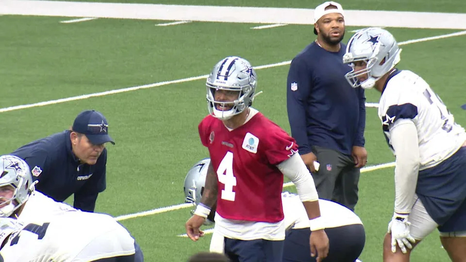 <div>Dallas Cowboys quarterback Dak Prescott calls out to teammates during practice at the Ford Center in Frisco.</div>