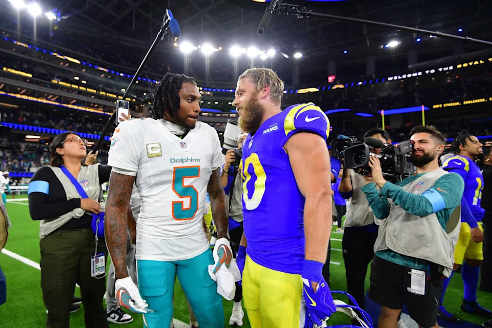 Miami Dolphins cornerback Jalen Ramsey (5) meets with Los Angeles Rams wide receiver Cooper Kupp (10) following the game at SoFi Stadium.Gary A. Vasquez-Imagn Images