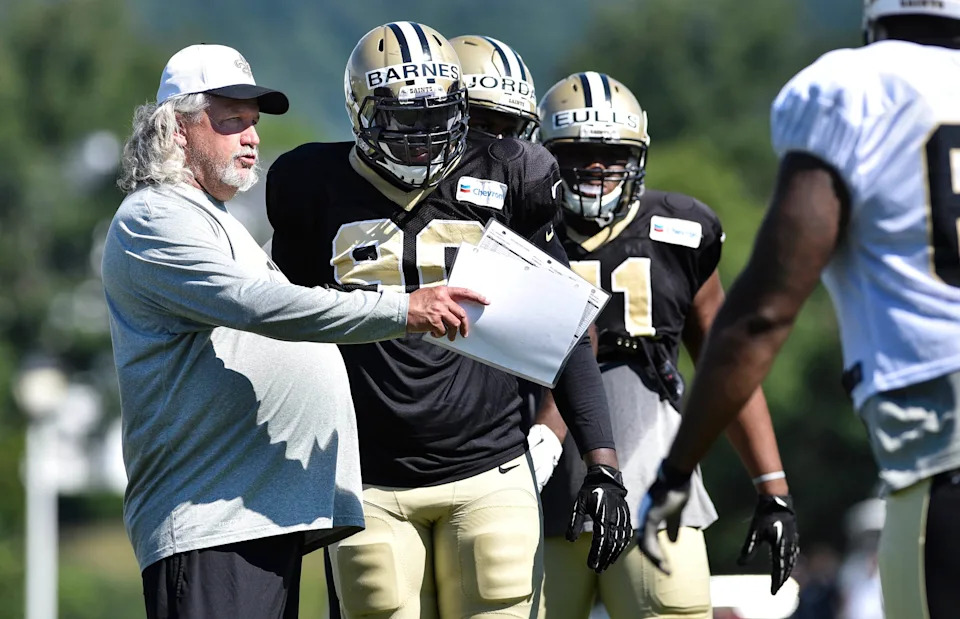 Aug 3, 2015; White Sulphur Springs, WV, USA; New Orleans Saints defensive coordinator Rob Ryan instructs defensive lineman Tavaris Barnes (90) during training camp at The Greenbrier. Mandatory Credit: Michael Shroyer-USA TODAY Sports