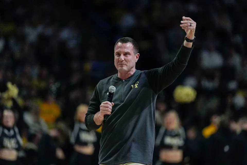 Jan 25, 2025; Winston-Salem, North Carolina, USA; New Wake Forest Demon Deacons football coach Jake Dickert speaks to the fans during the first half between the Wake Forest Demon Deacons and the Duke Blue Devils at Lawrence Joel Veterans Memorial Coliseum. © Jim Dedmon-Imagn Images