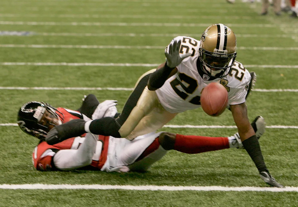 Sept 25, 2006; New Orleans, LA, USA; New Orleans Saints (22) Fred Thomas breaks up a pass intended for Atlanta Falcons (87) Ashley Lelie in the second quarter of the Atlanta Falcons at New Orleans Saints game at the Louisiana Superdome in New Orleans, LA. Mandatory Credit: Matt Stamey-USA TODAY Sports Copyright Matt Stamey