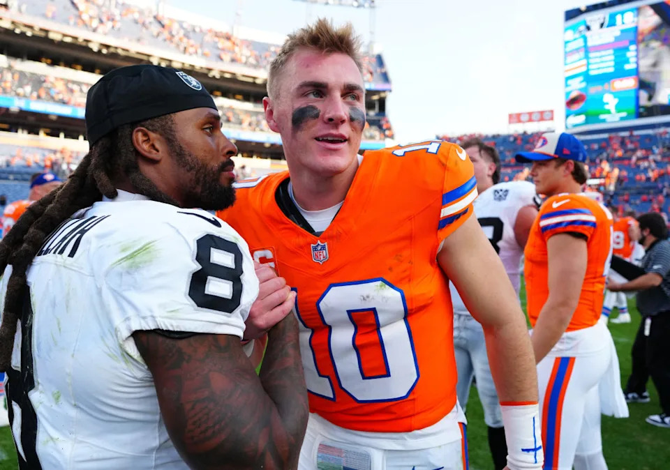 Denver Broncos QB Bo Nix (10) and former Las Vegas Raiders RB Ameer Abdullah (8).Ron Chenoy-Imagn Images