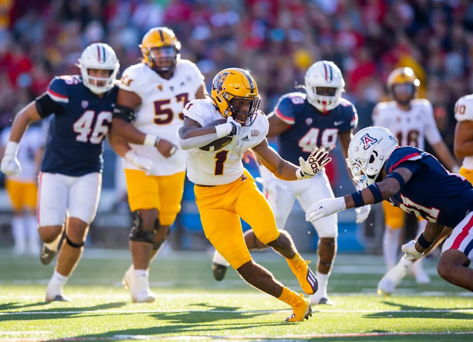 Nov 25, 2022; Arizona State Sun Devils running back Xazavian Valladay (1) runs against the Arizona Wildcats. Mandatory Credit: Mark J. Rebilas-Imagn Images