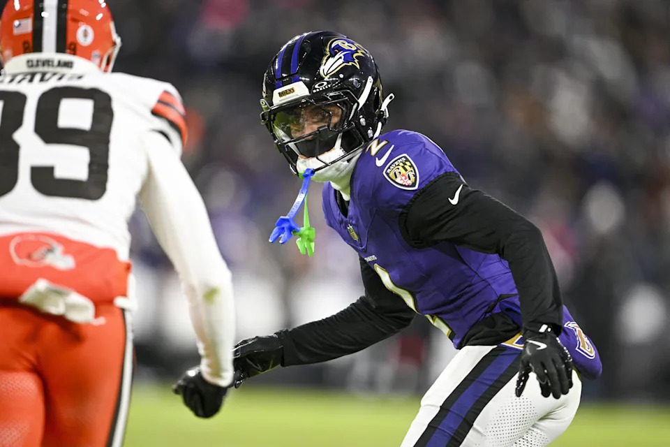 Jan 4, 2025; Baltimore, Maryland, USA; Baltimore Ravens cornerback Nate Wiggins (2) drops back in coverage as Cleveland Browns wide receiver Kaden Davis (89) runs a route during the first half at M&T Bank Stadium. Mandatory Credit: Tommy Gilligan-Imagn Images
