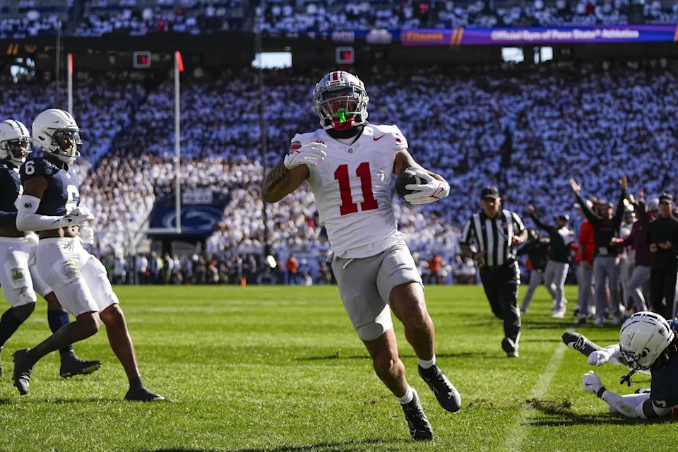 Ohio State Buckeyes wide receiver Brandon Inniss (11) makes a touchdown catch during the first half of the NCAA football game against the Penn State Nittany Lions at Beaver Stadium in University Park, Pa. on Saturday, Nov. 2, 2024.