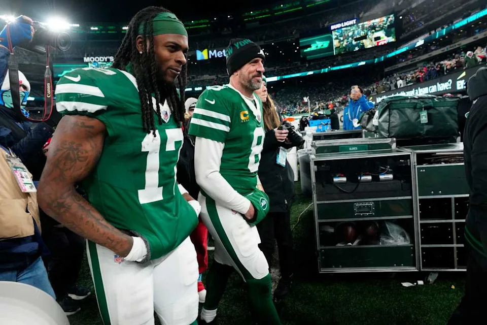 New York Jets wide receiver Davante Adams (17) and New York Jets quarterback Aaron Rodgers (8) are shown as they get ready to step off the field at MetLife StadiumKevin R&period; Wexler-NorthJersey&period;com &sol; USA TODAY NETWORK via Imagn Images