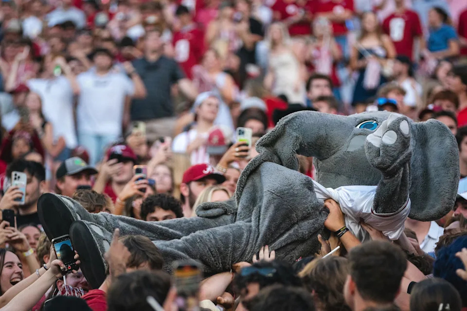 Oct 26, 2024; Tuscaloosa, Alabama, USA; Alabama Crimson Tide mascot ÒBig AlÓ crowd surfs the student section during the fourth quarter against the Missouri Tigers at Bryant-Denny Stadium. Mandatory Credit: Will McLelland-Imagn Images